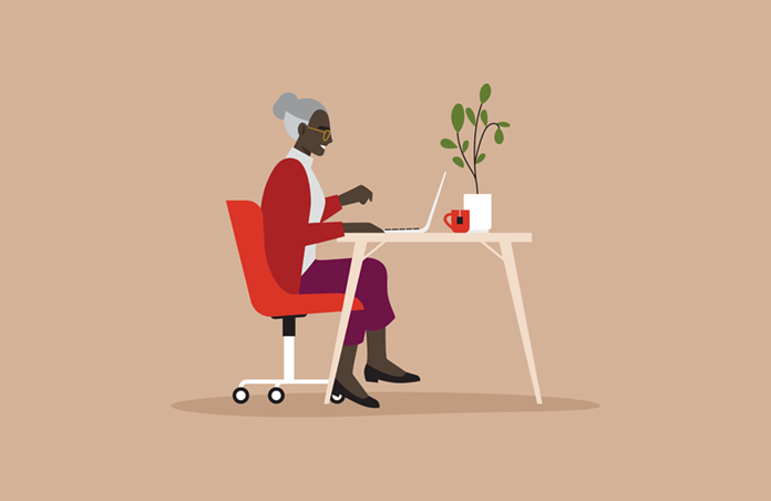 Illustration of a woman sitting at a table typing on a laptop